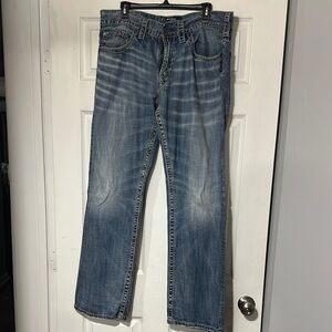 Silver Zac Bootcut 36L Jeans with Medium Wash and Natural Wear Patterns